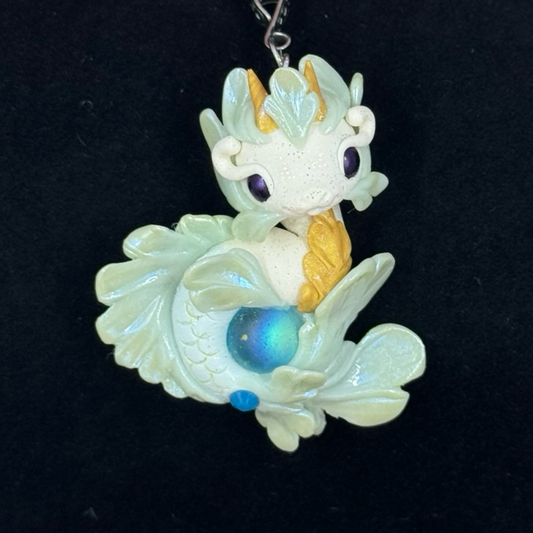 White and Blue Baby Sea Dragon Pendant