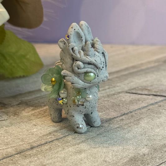 Tiny Stone Bunnigon with Mint Green Eyes and Flowers