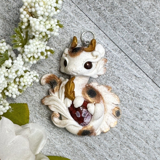White with Bronze and Black Calico Spots Dragon Pendant