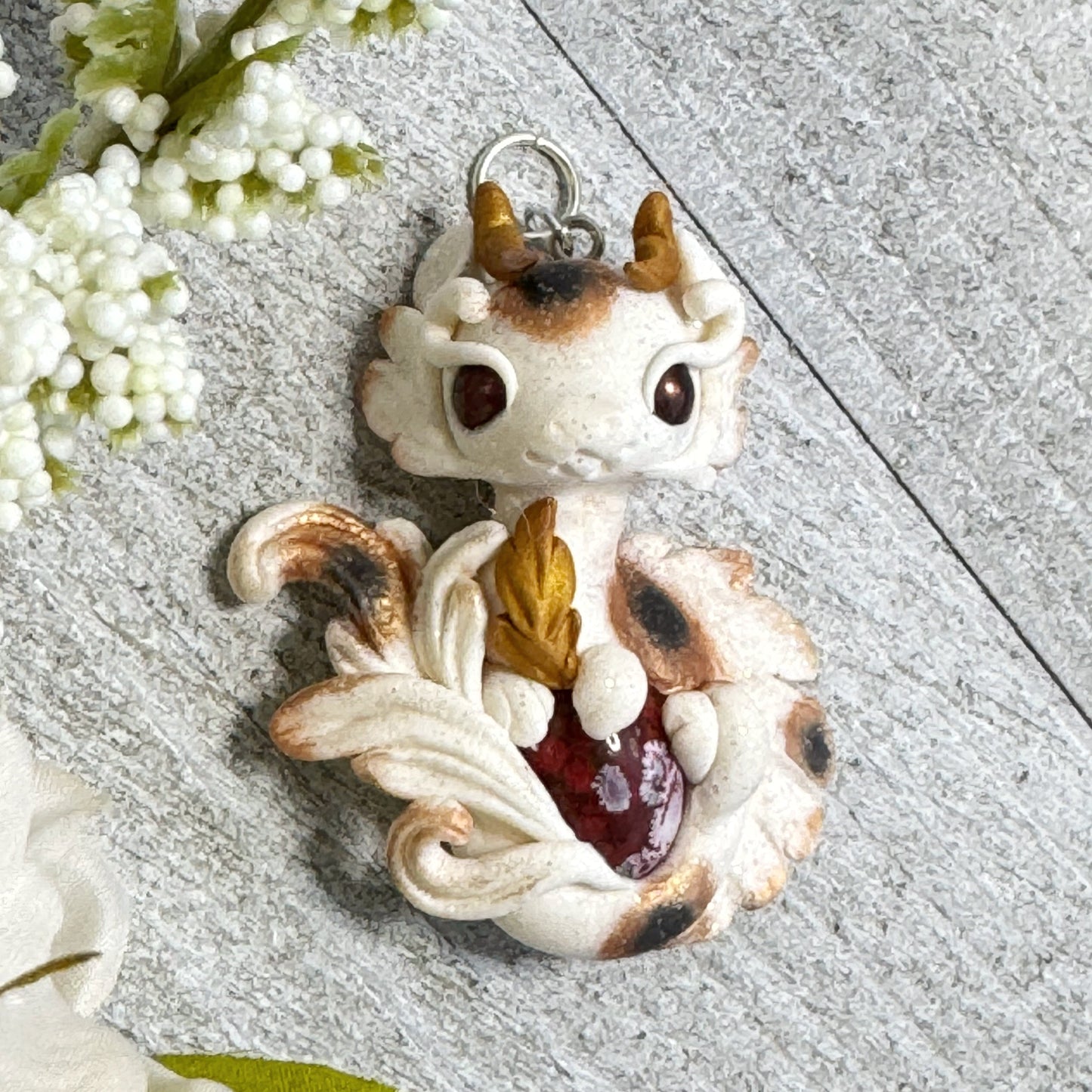 White with Bronze and Black Calico Spots Dragon Pendant