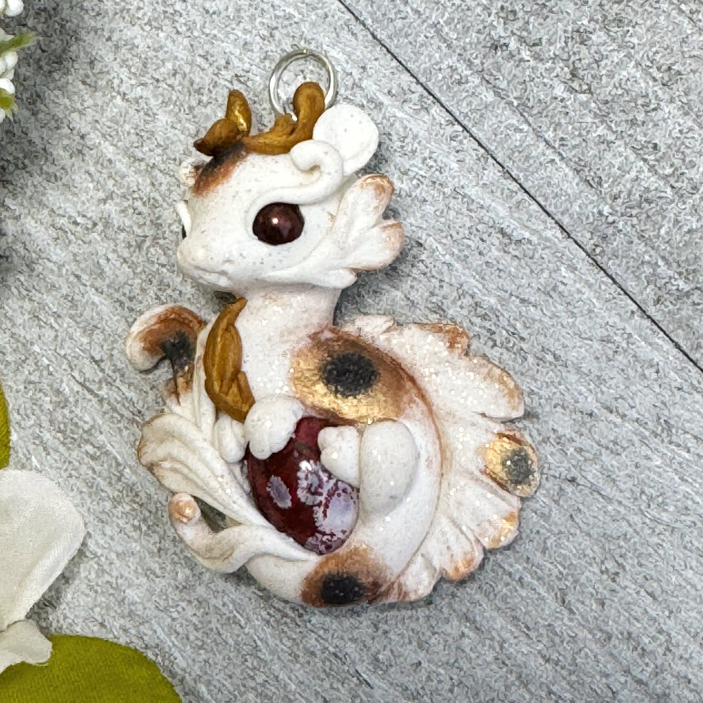 White with Bronze and Black Calico Spots Dragon Pendant