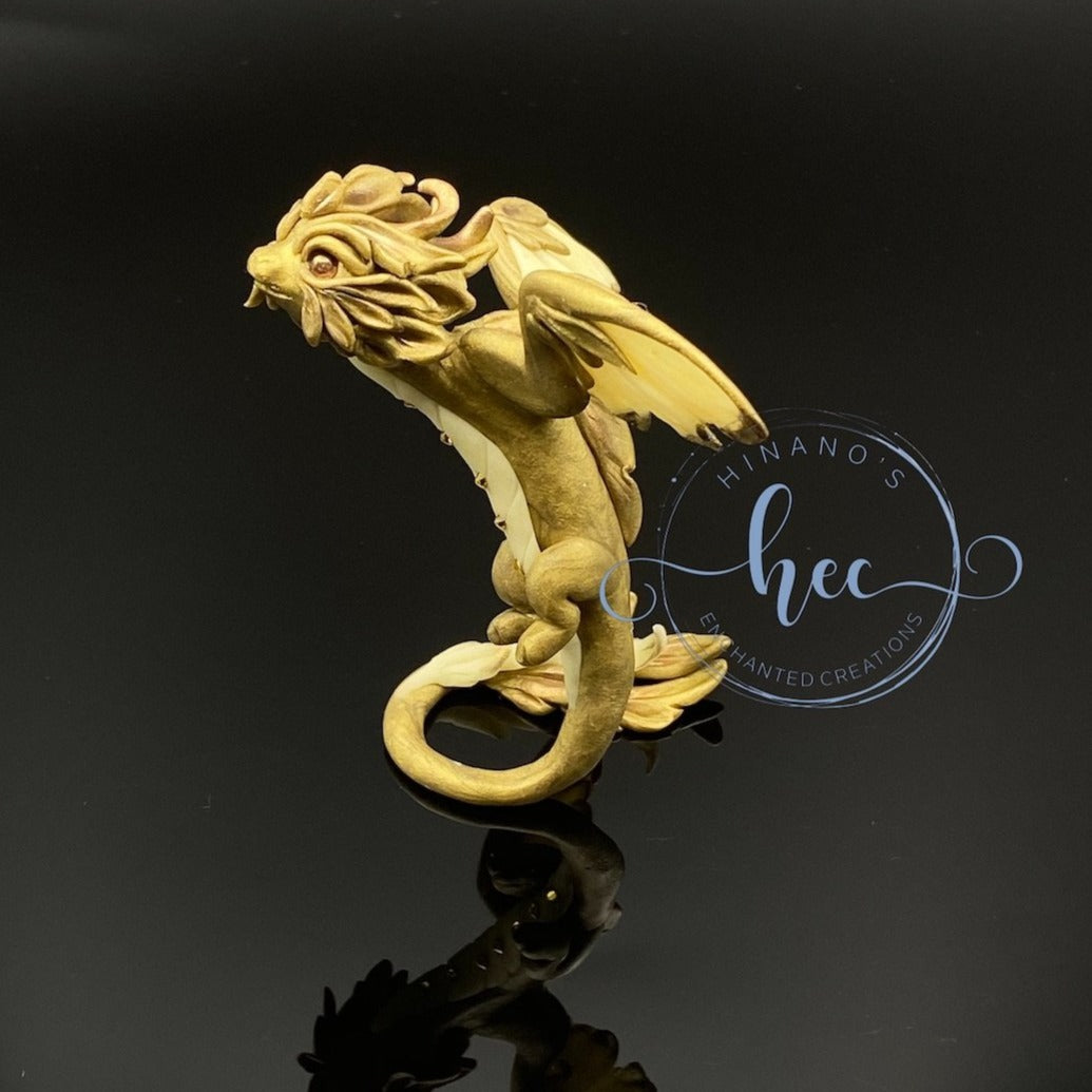 Baby bronze dragon in flight