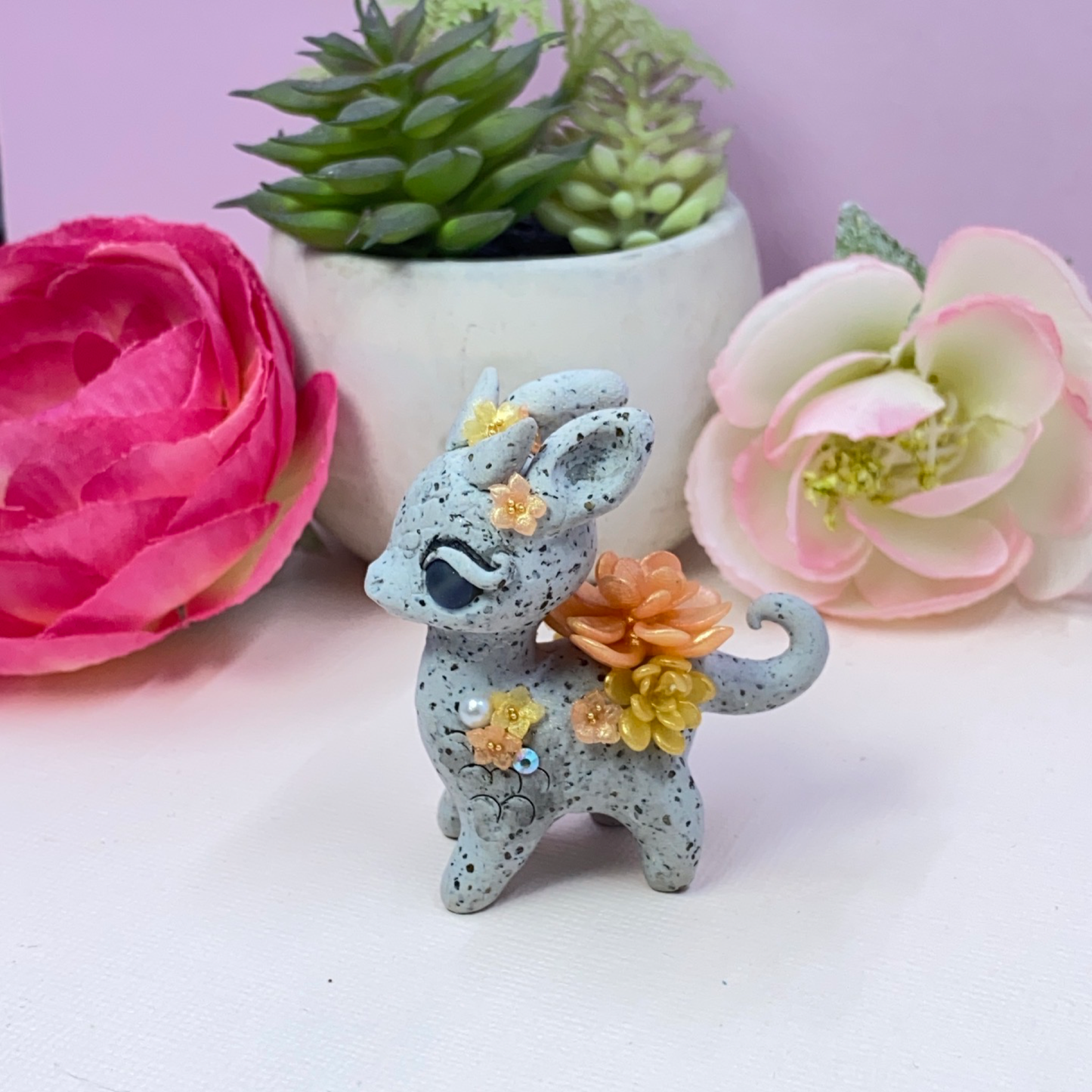 Stone Dragon with Peach and Yellow Succulents