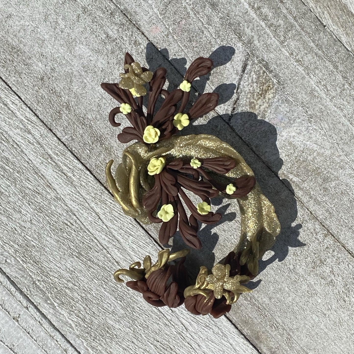 Shy Golden Dragon with Yellow Flowers