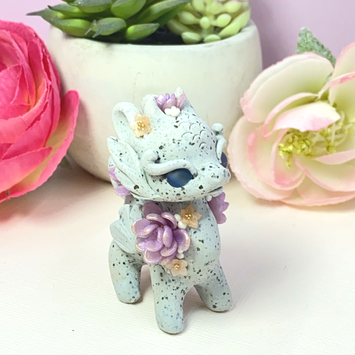 Stone Dragon with Purple Succulents