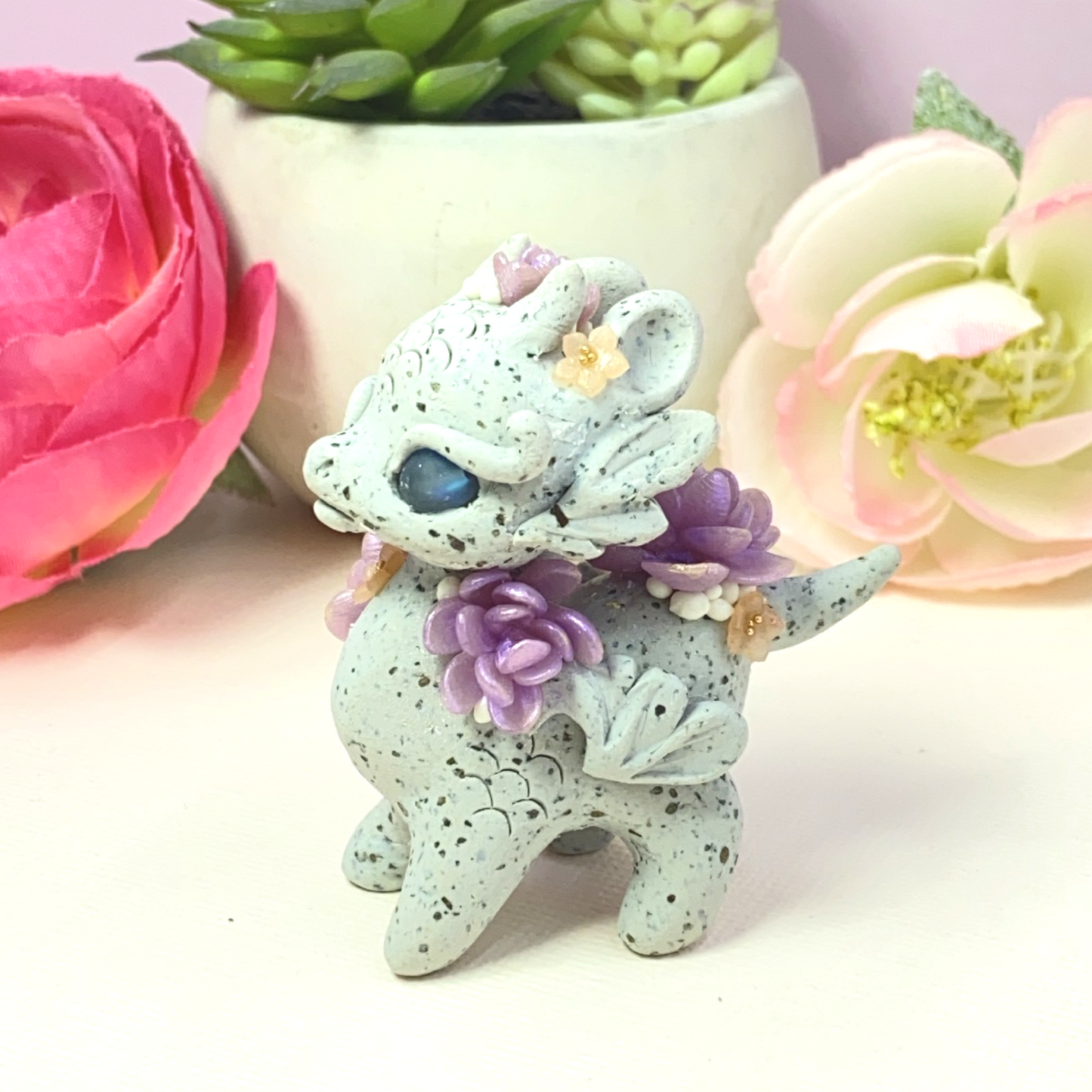 Stone Dragon with Purple Succulents
