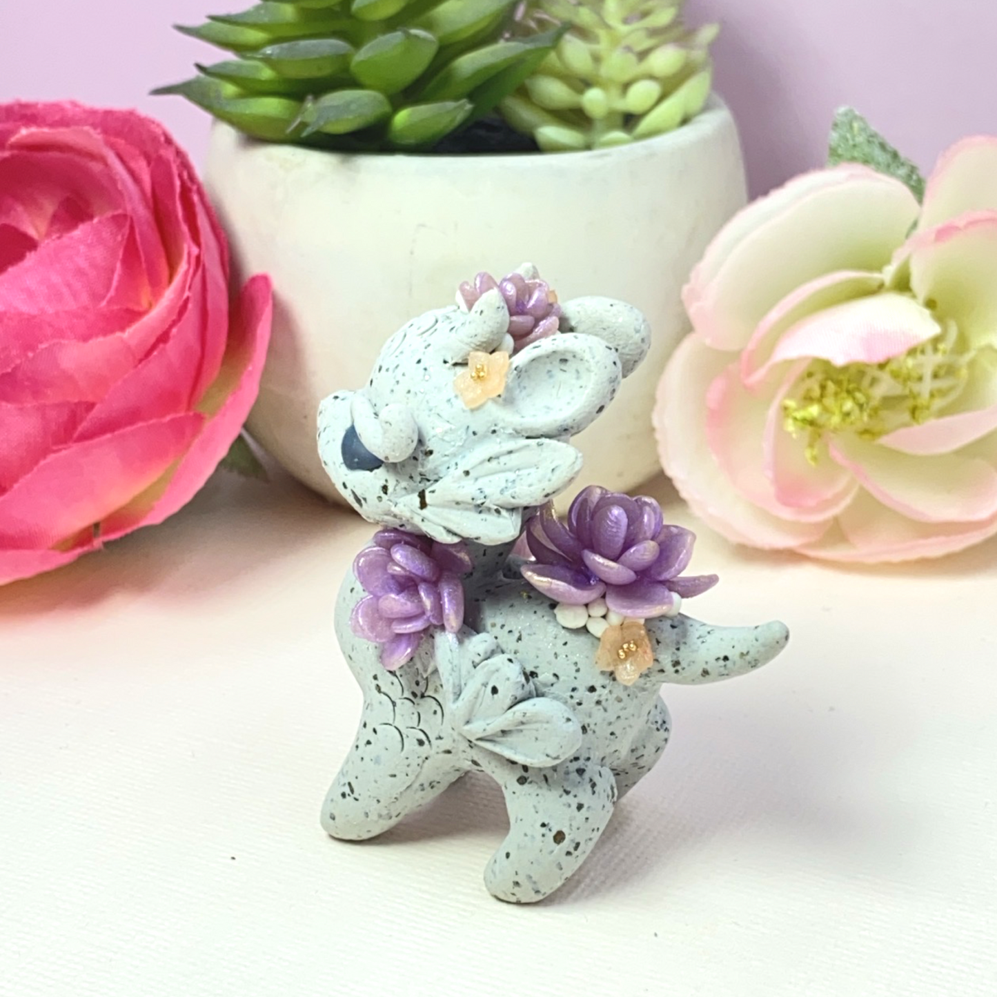 Stone Dragon with Purple Succulents