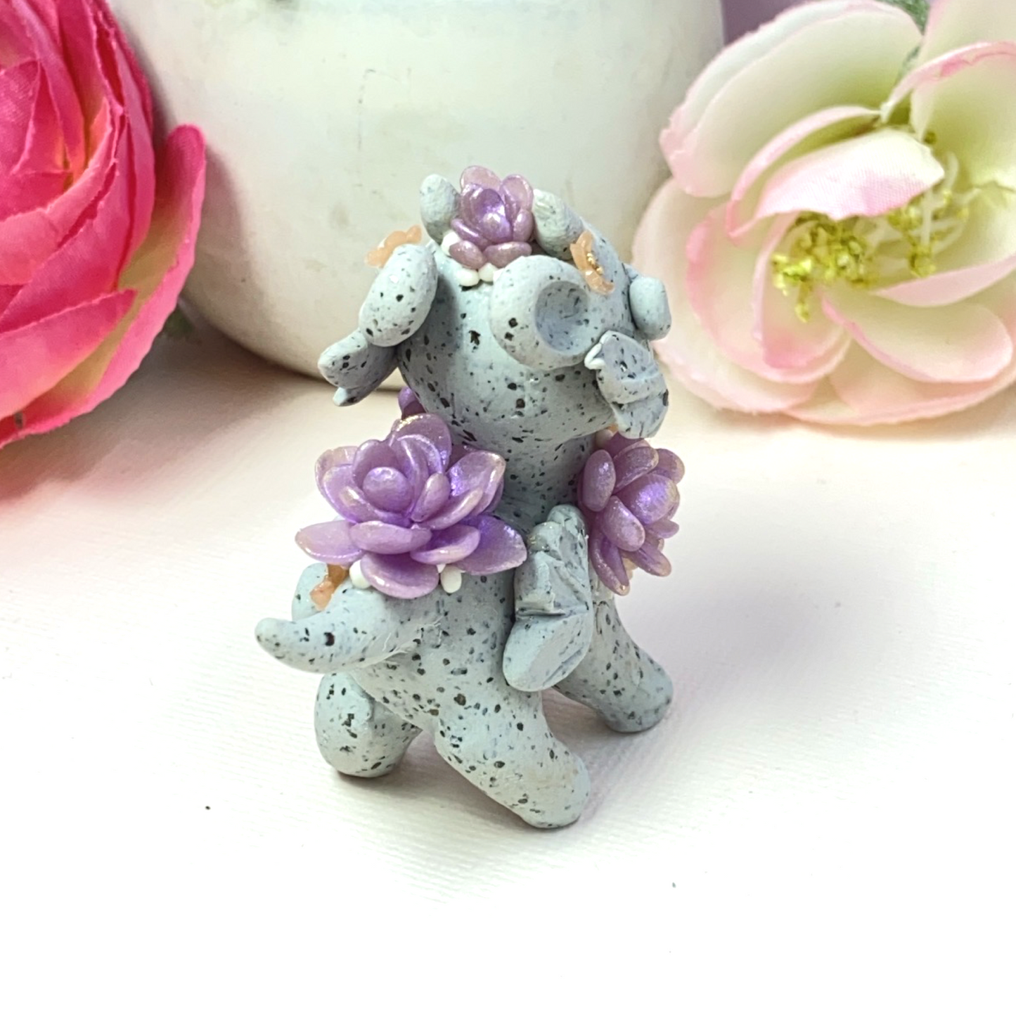 Stone Dragon with Purple Succulents