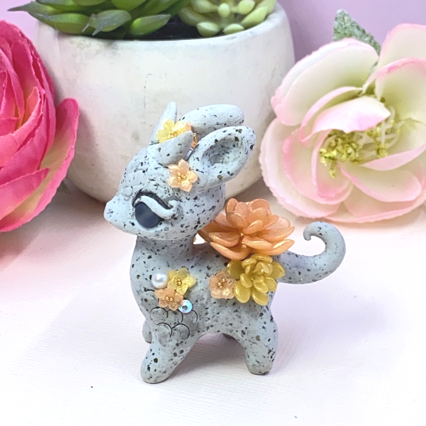 Stone Dragon with Peach and Yellow Succulents