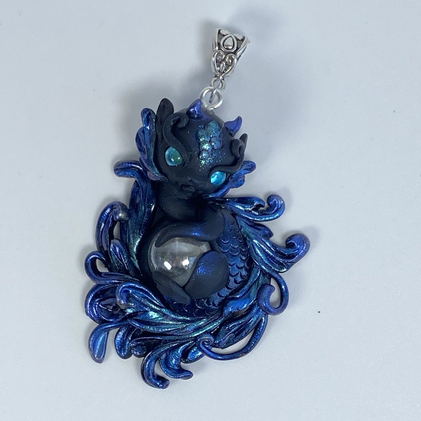 Fancy tailed blue and Black Dragon