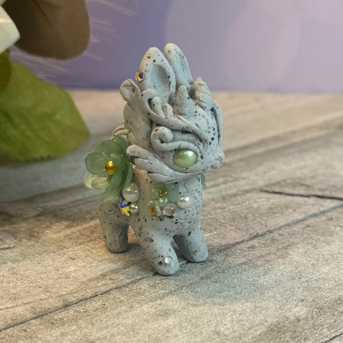 Tiny Stone Bunnigon with Mint Green Eyes and Flowers