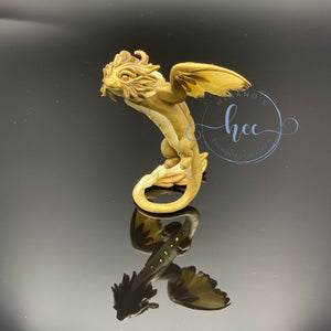 Baby bronze dragon in flight