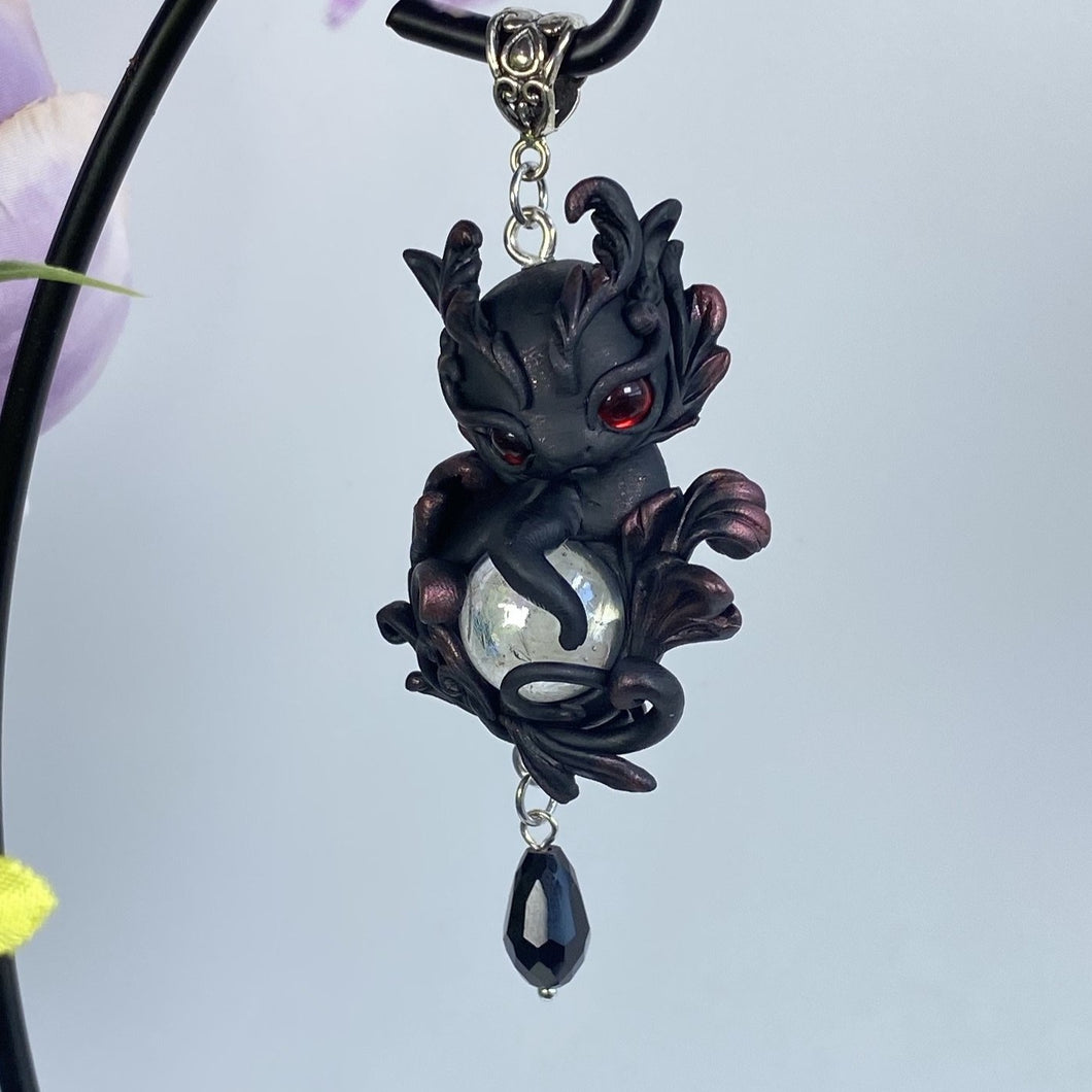 Black and Red Dragon With Crystal