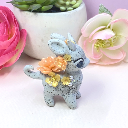 Stone Dragon with Peach and Yellow Succulents