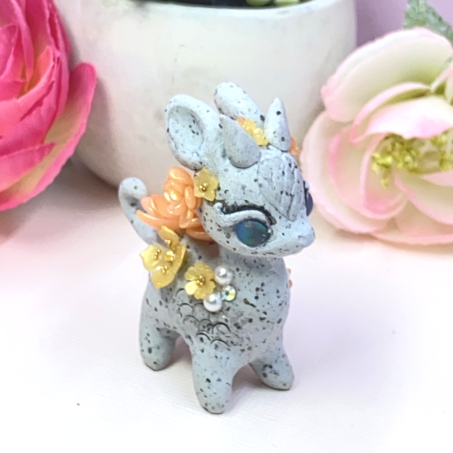 Stone Dragon with Peach and Yellow Succulents