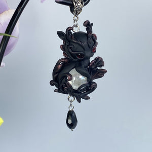 Black and Red Dragon With Crystal