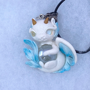 White and blue baby dragon pendant