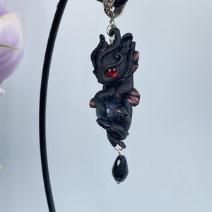 Black and Red Dragon With Crystal